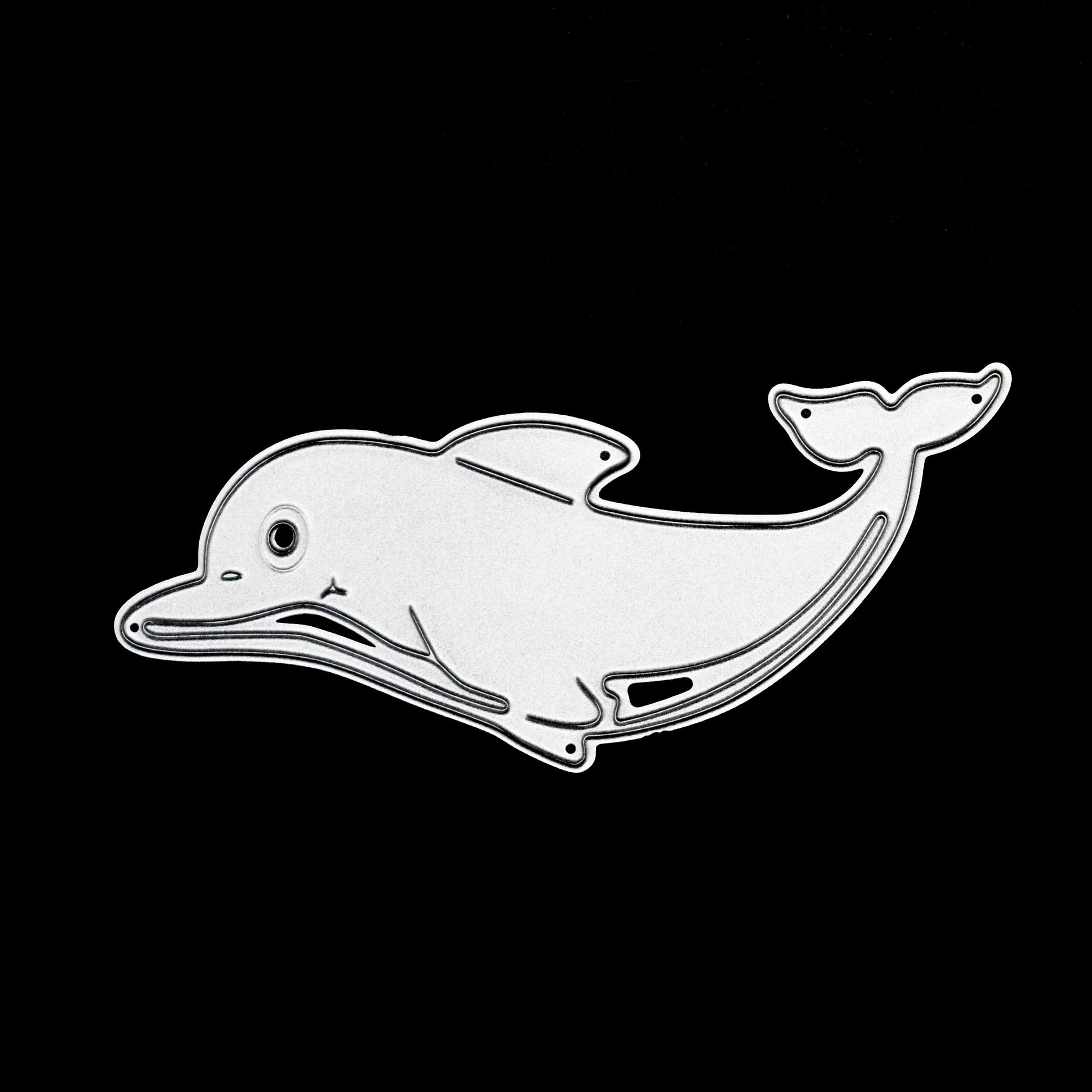 Ocean dolphin metal cutting die showing embossed detail and separate tail piece