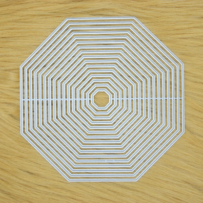 Octagon nesting cutting dies set on faux fur surface