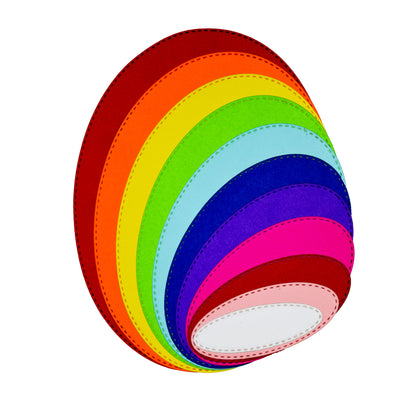 Layered rainbow oval die cuts made with double stitched oval nesting metal cutting dies for card making and papercraft.