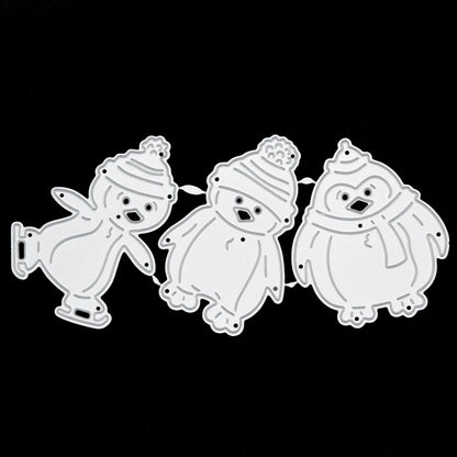 Penguin metal cutting dies displayed on black background for craft projects