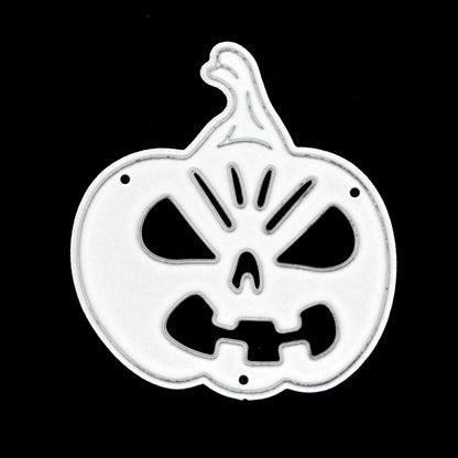 Jack o’ lantern pumpkin metal cutting die displayed on a black background, showing the cut-out facial details clearly.