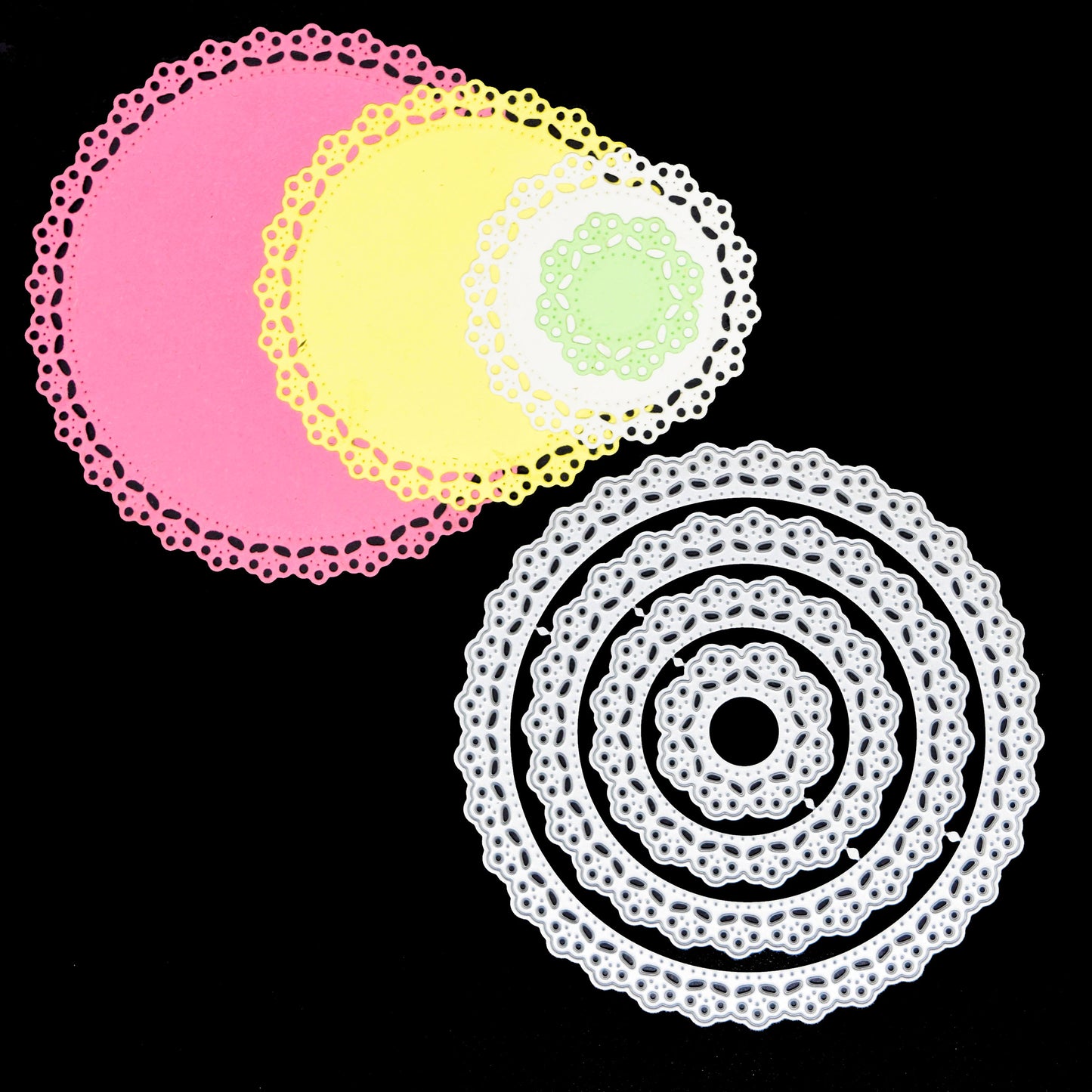 Round lace nesting dies with finished layered paper cut examples in different sizes