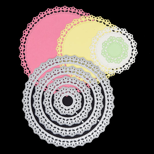 Round lace nesting dies with finished layered paper cut examples in different sizes