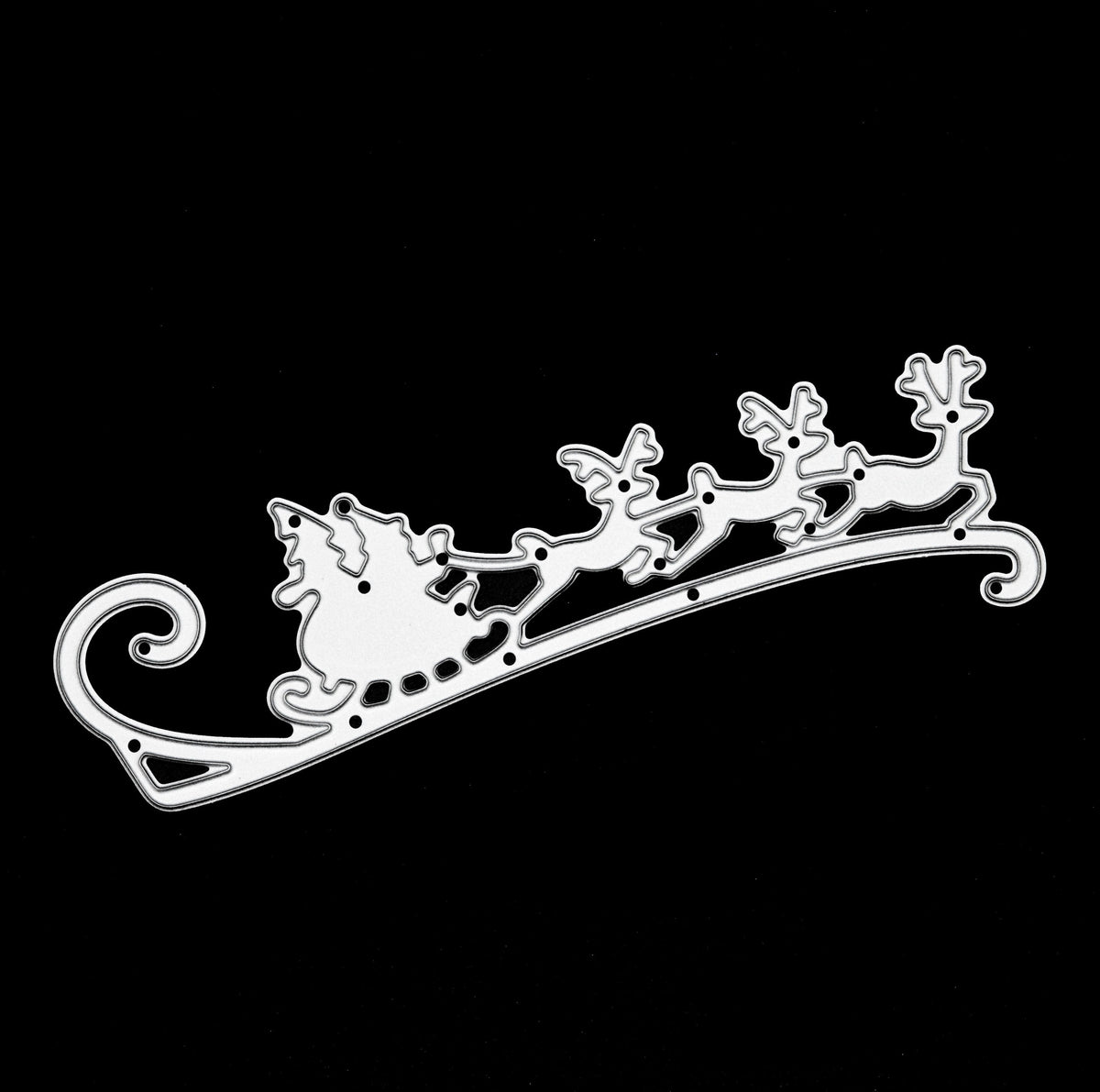 Santa sleigh and reindeer craft die photographed on black background for detail visibility