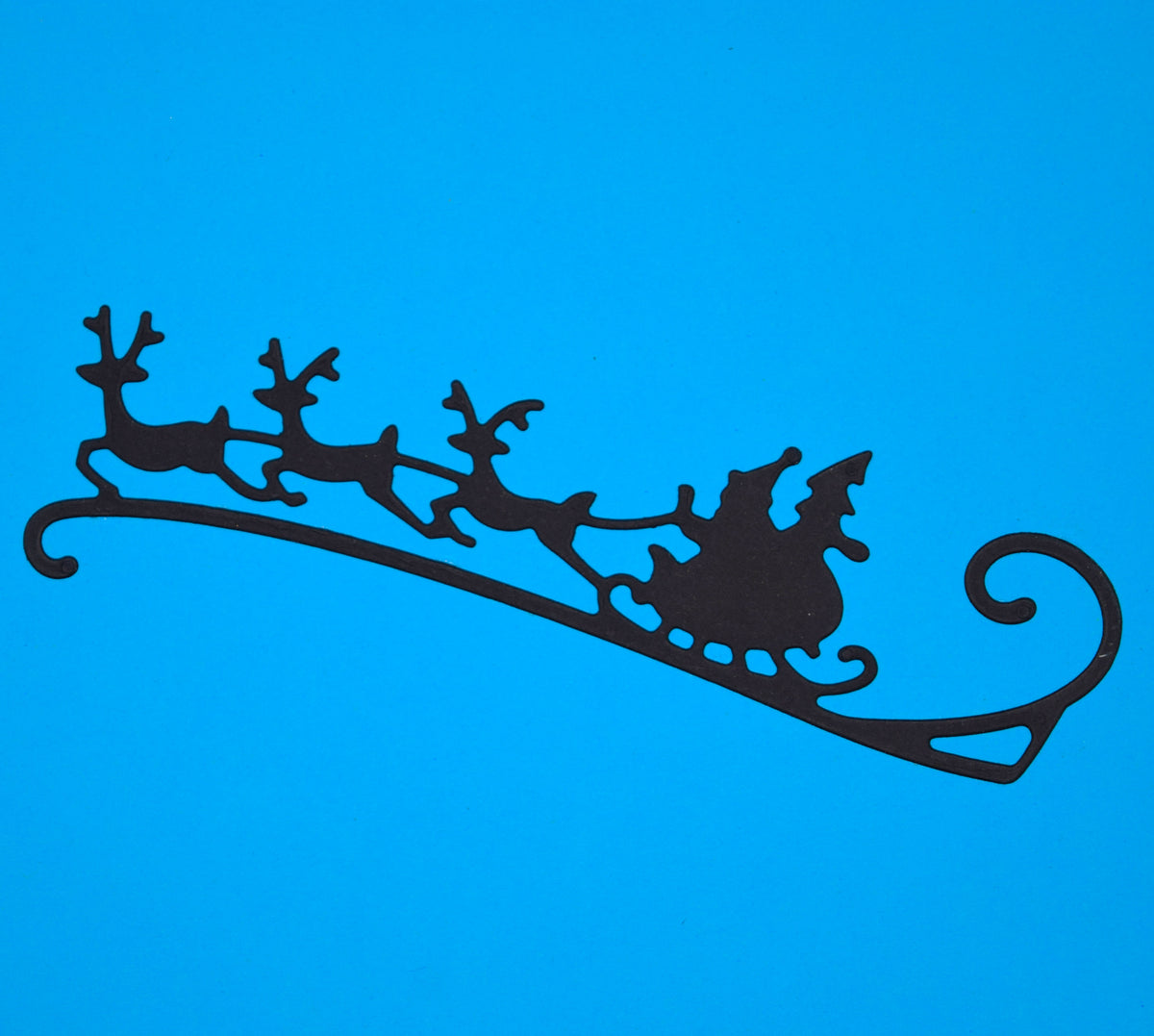 Santa sleigh and flying reindeer silhouette die cut for Christmas papercrafts