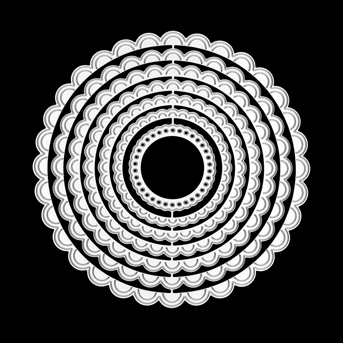 Scalloped circle nesting metal cutting die set displayed on black background