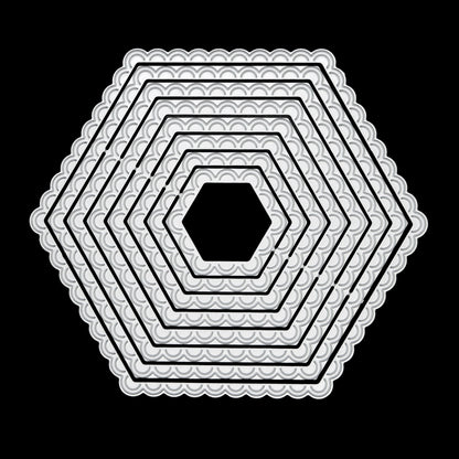Graduated scalloped hexagon nesting metal cutting dies displayed together on a black background for card making and papercraft.