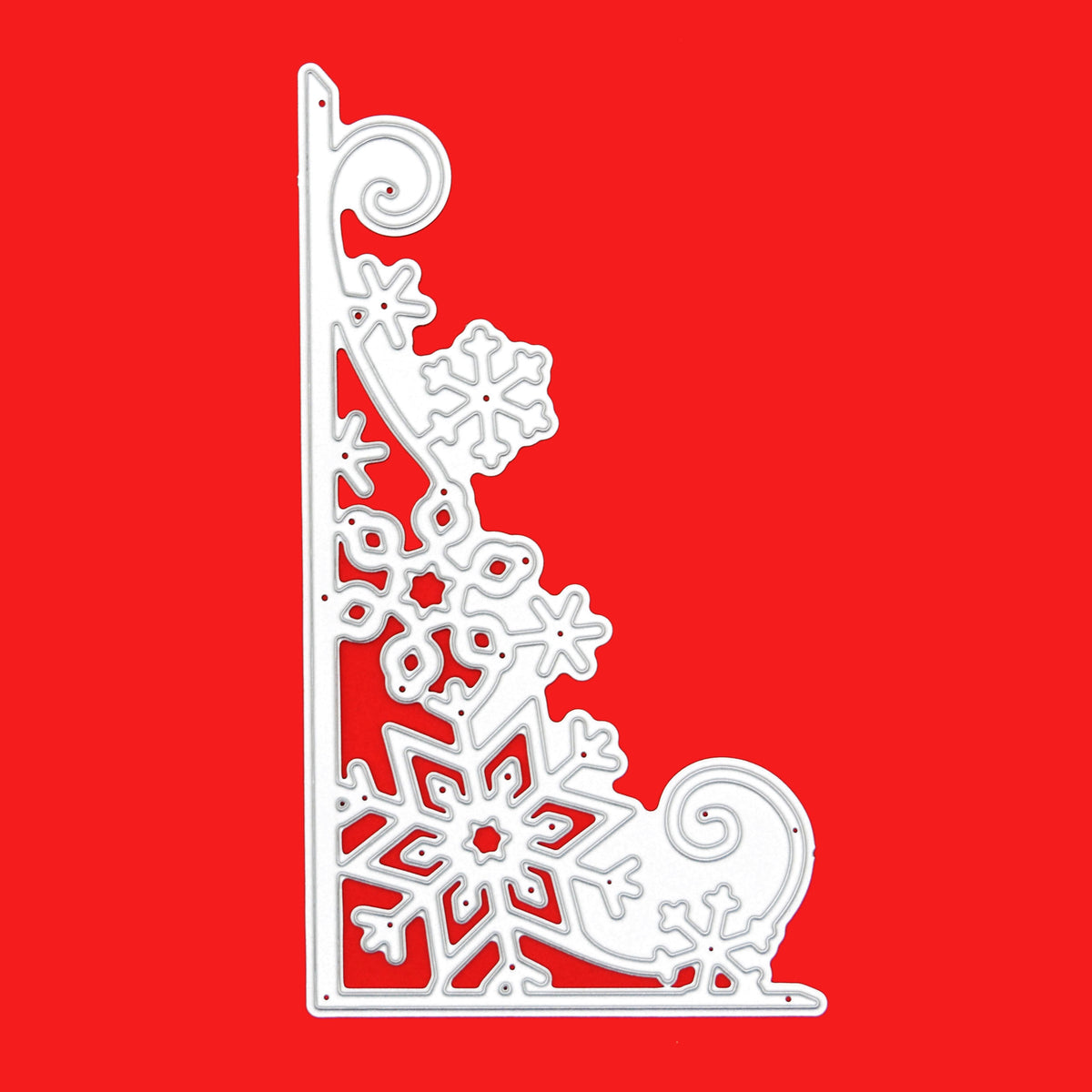 Large snowflake corner border metal cutting die displayed on a bright red background, showing the intricate snowflake and swirl details.