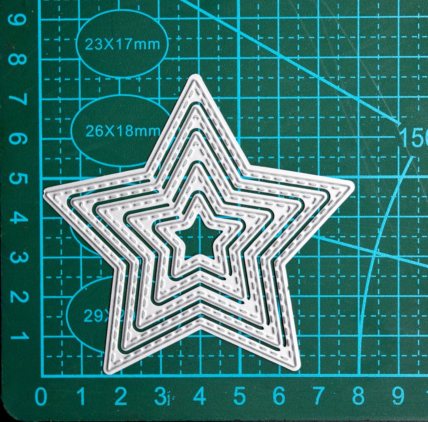 Stitched star nesting dies size reference on cutting mat for card making projects