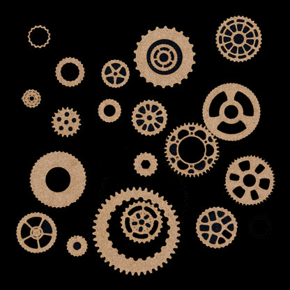 Steampunk gear wheel die cuts in kraft card showing 20 different cog and wheel designs