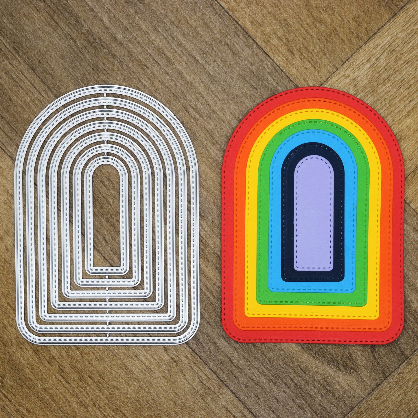 Seven stitched arch metal cutting dies displayed beside colourful graduated die cuts on a wood-effect background.