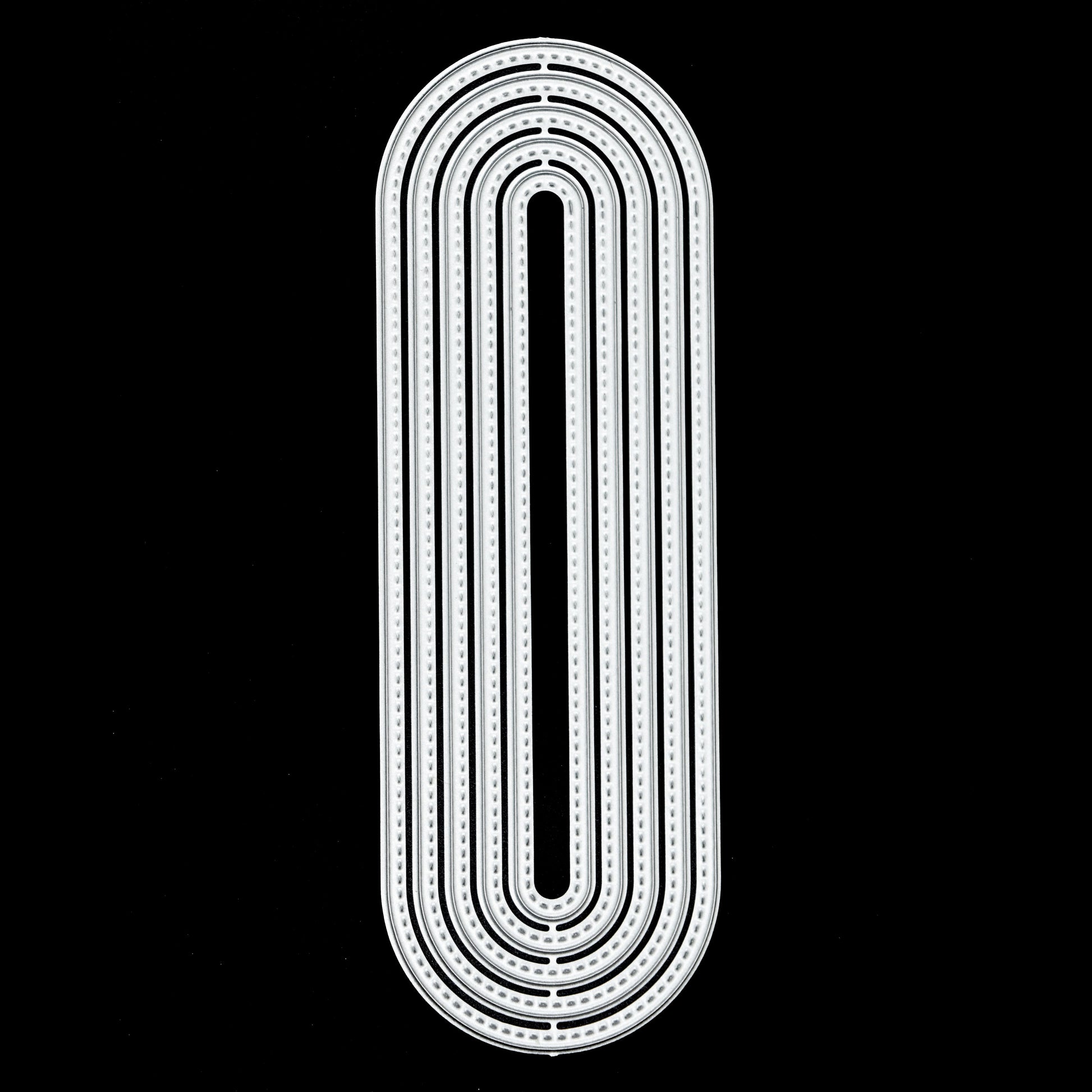 Stitched slimline oval metal cutting dies showing pierced edge detail and nesting sizes