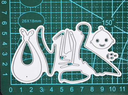 Stork and baby metal cutting dies on measuring mat showing size