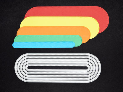 stretched oval cardstock cuts alongside matching metal cutting dies