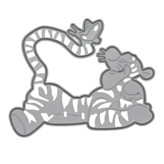 Tigger metal cutting die on white, showing the smiling character in a reclining pose with a curled striped tail.