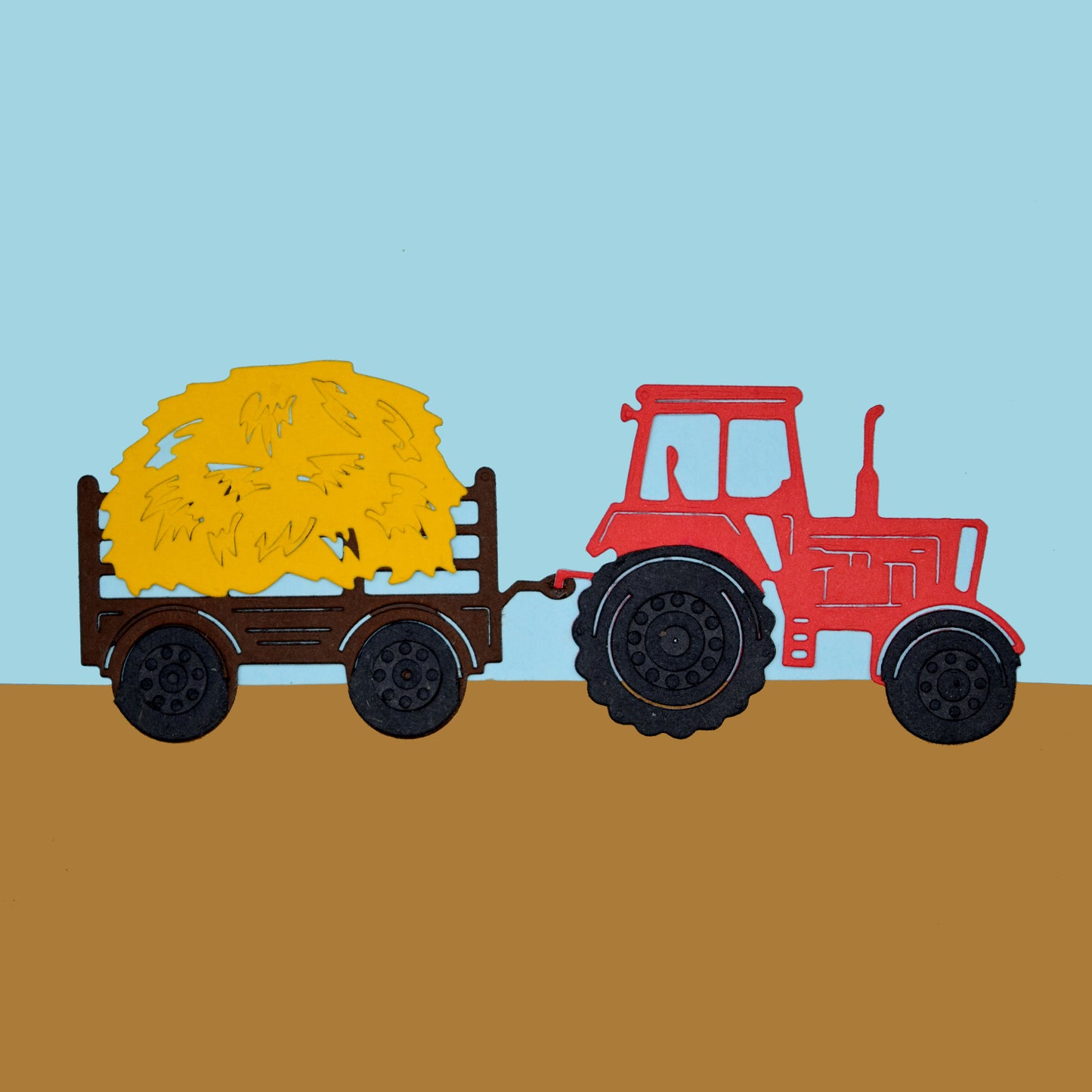 Finished farm scene made with tractor and trailer metal cutting dies with hay load