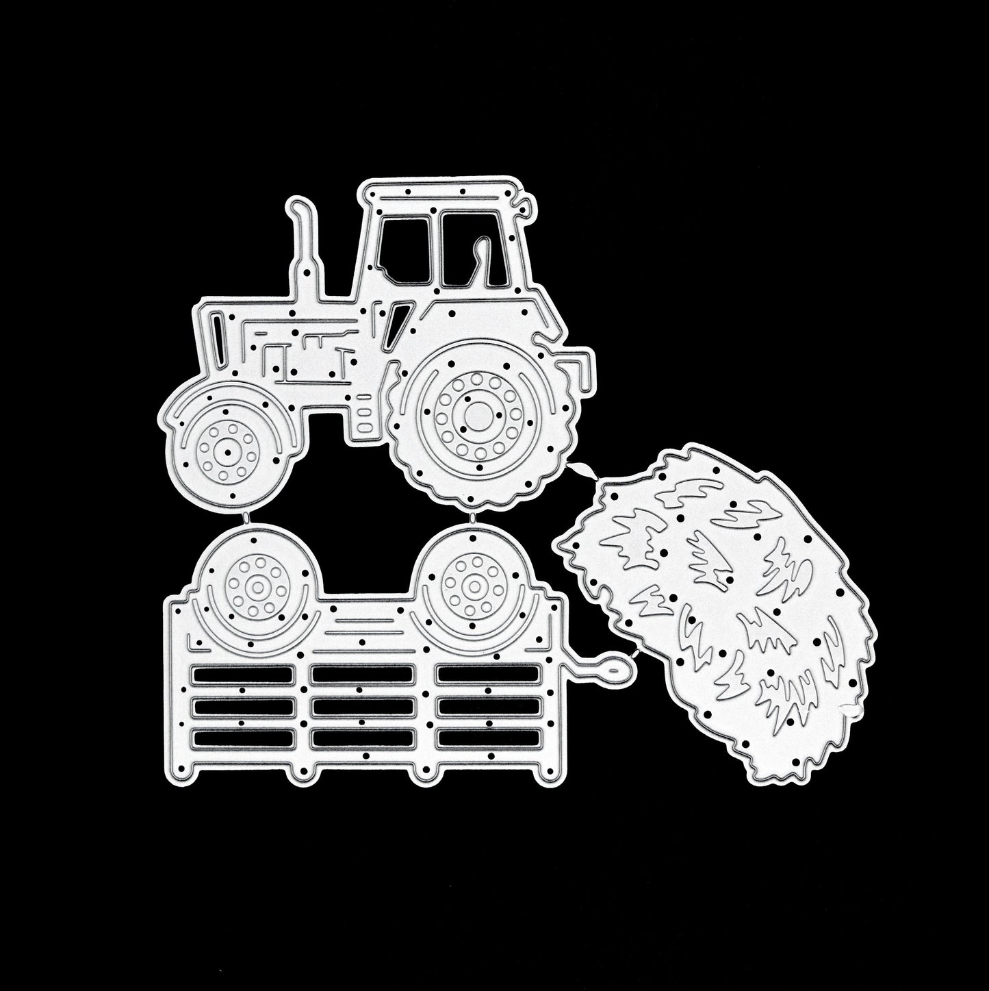 Tractor and trailer metal cutting dies held in hand showing size and detail
