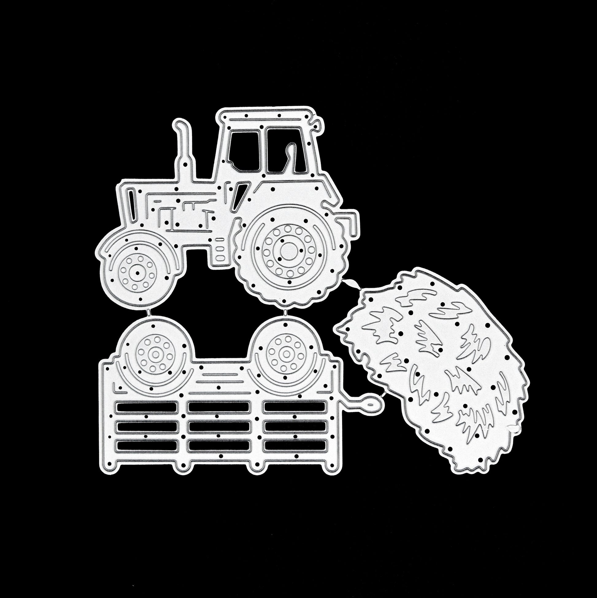 Tractor and trailer metal cutting dies held in hand showing size and detail