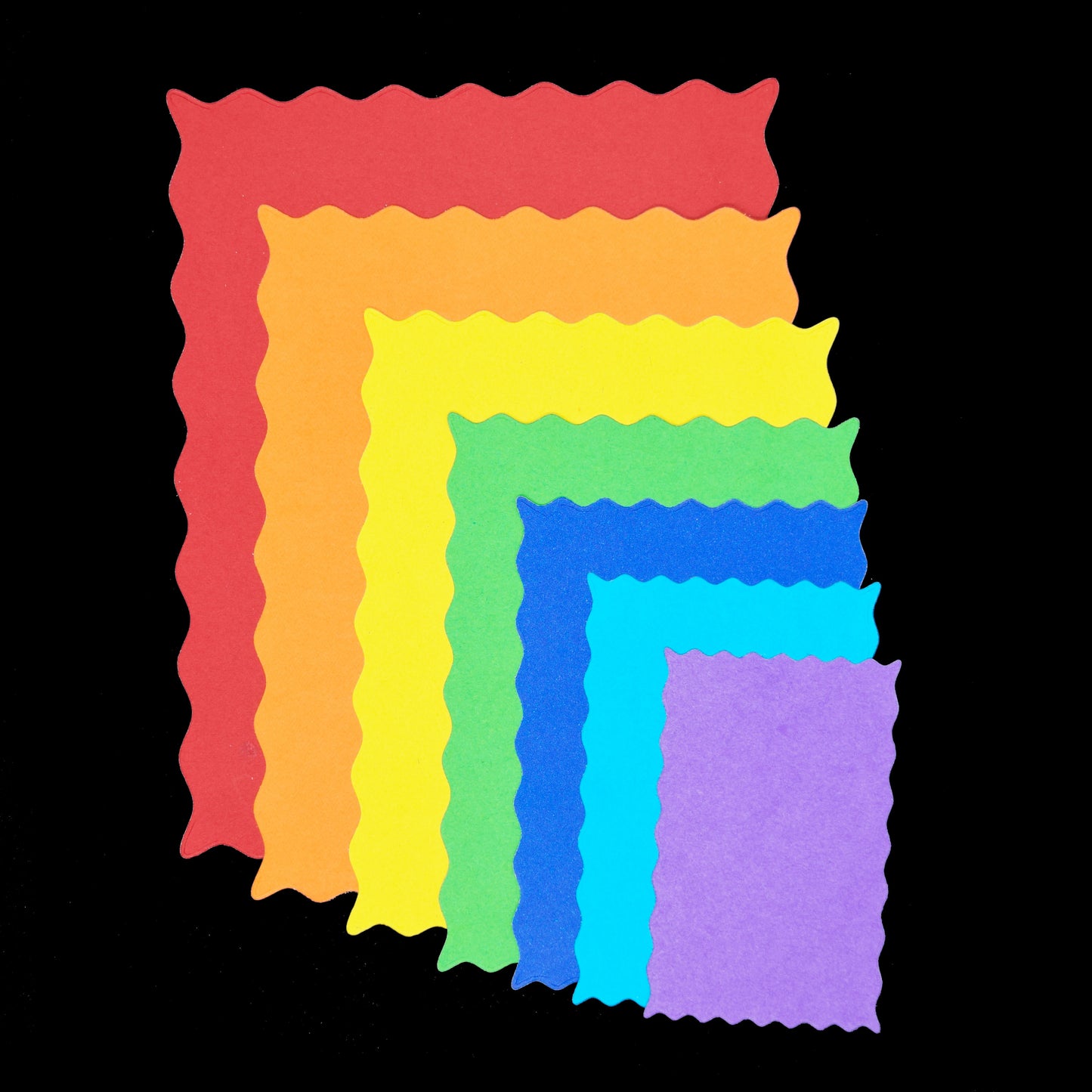 Wavy rectangle die cut frames in coloured card