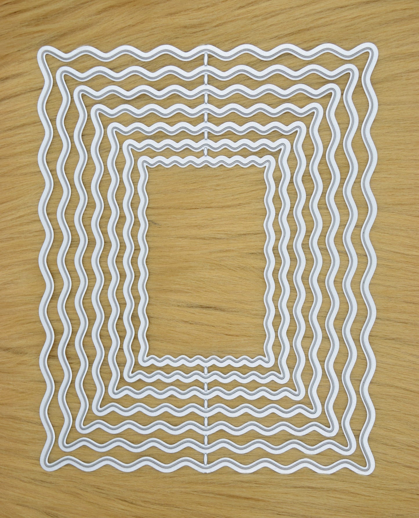 Wavy rectangle nesting dies on faux fur background