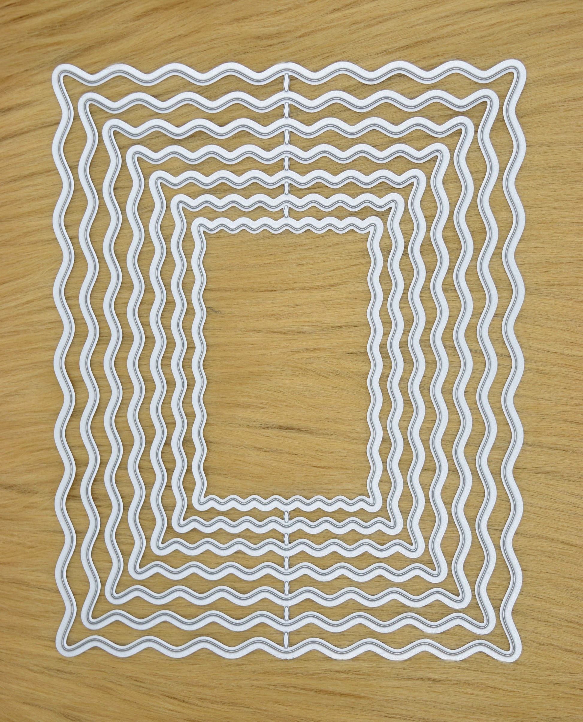 Wavy rectangle nesting dies on faux fur background