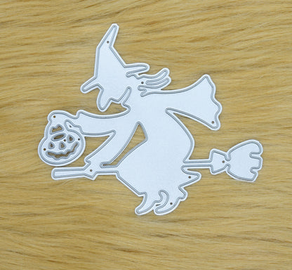 Witch on broomstick metal cutting die on faux fur background